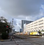 Northbound Brightline Train about to cross Fern Street in Downtown WPB 